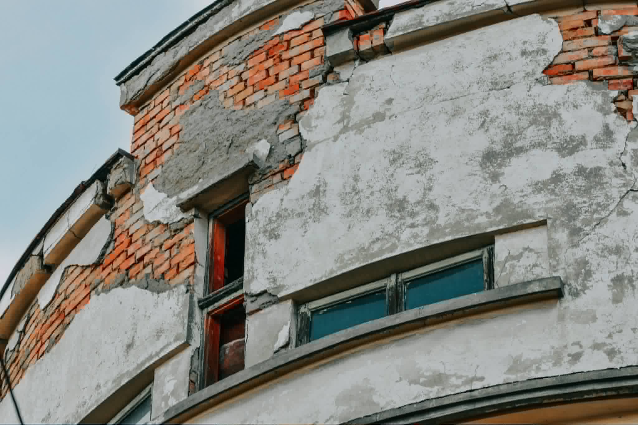 Render removal from brickwork London
