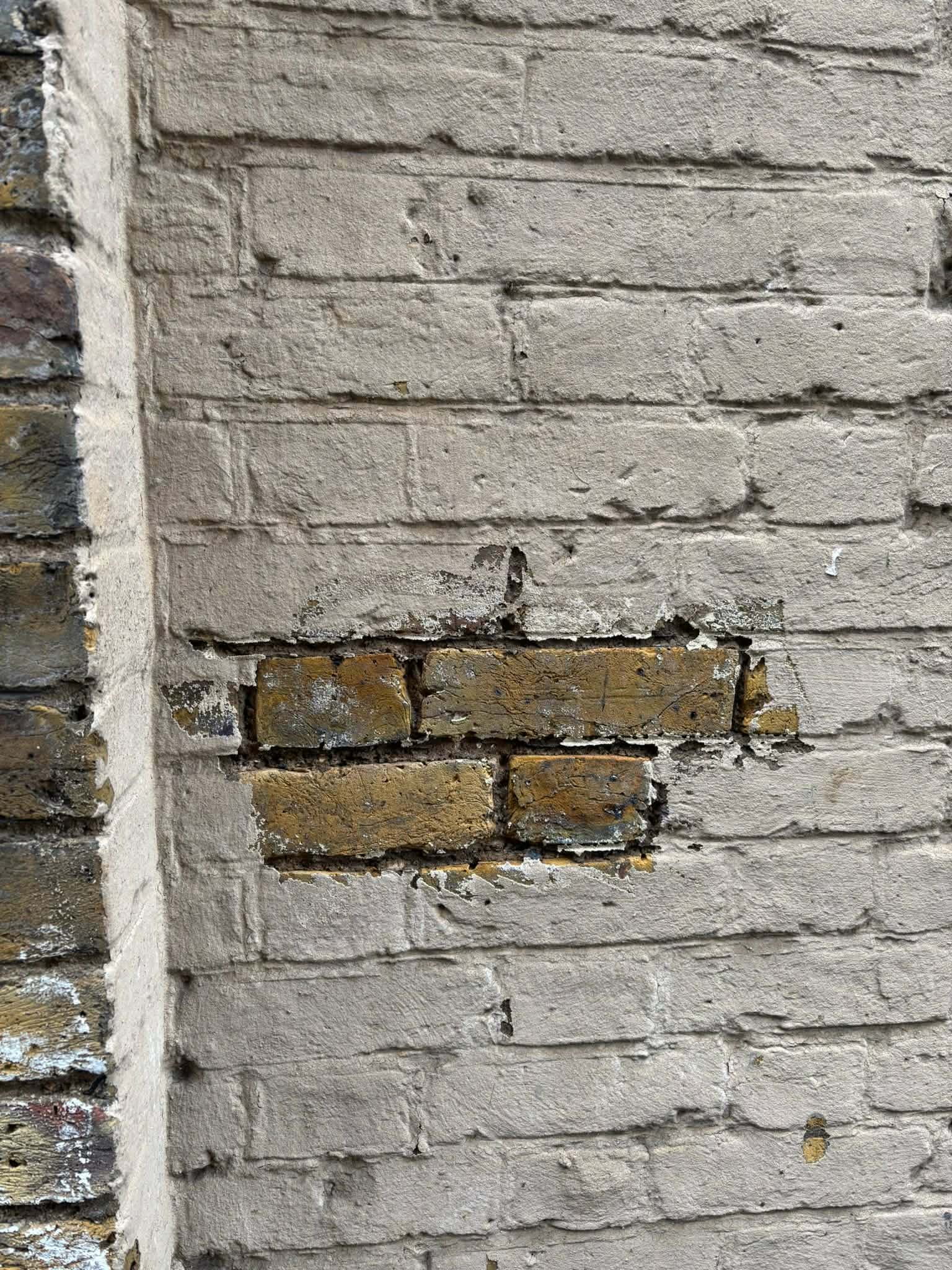 Failed cement pointing requiring lime repointing London repair