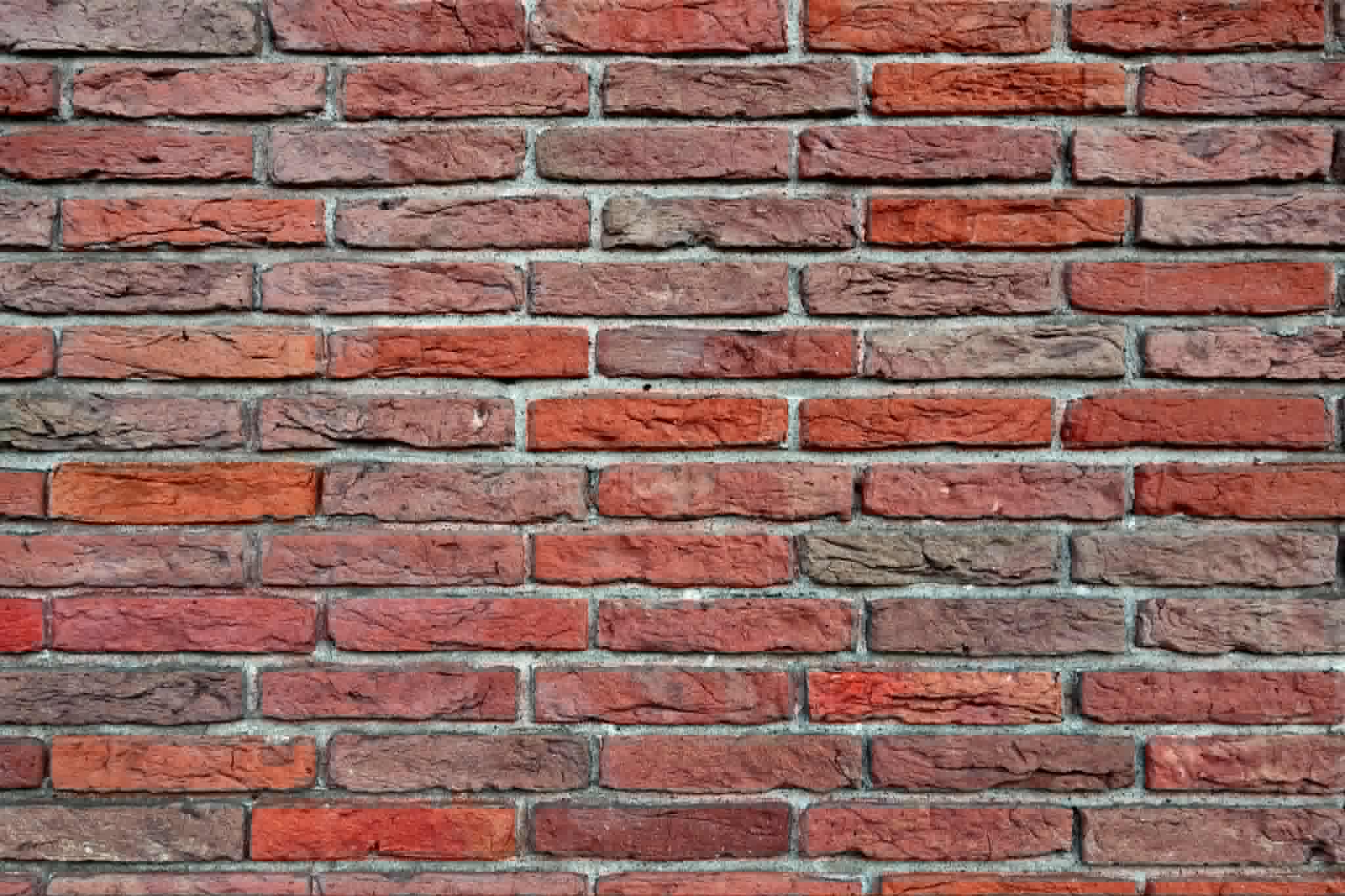 Weathered mortar joints before lime repointing London works
